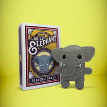 Load image into Gallery viewer, Mini grey elephant felt toy that comes in its own bespoke matchbox. Complete with pillow and bedding - perfect for tucking in at night time. Your little friend also comes with an adoption certificate, collectible playing card, and thank you card.