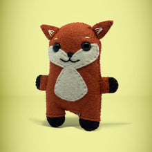 Load image into Gallery viewer, Front view of mini fox. A perfect little gift for any fox lover. Super cute, handmade from left over felt and a great keepsake present. Your little friend loves to cuddle, give hugs and comes with their own matchbox to sleep in. A wonderful stocking filler at christmas