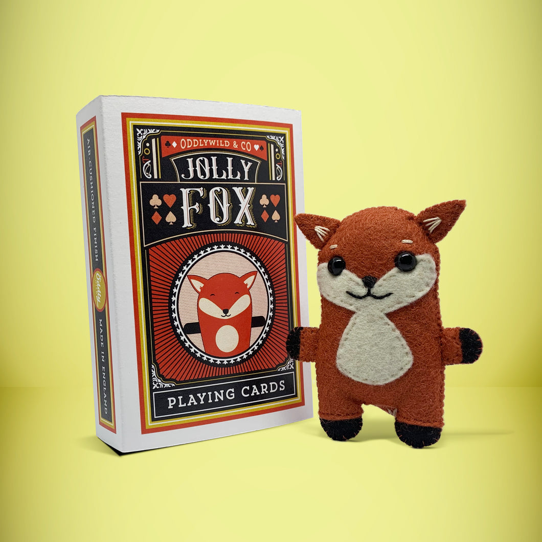 Mini red-orange fox felt toy that comes in its own bespoke matchbox. Complete with pillow and bedding - perfect for tucking in at night time. Your little friend also comes with an adoption certificate, collectible playing card, and thank you card.