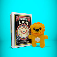 Load image into Gallery viewer, Mini yellow lion felt toy that comes in its own bespoke matchbox. Complete with pillow and bedding - perfect for tucking in at night time. Your little friend also comes with an adoption certificate, collectible playing card, and thank you card.