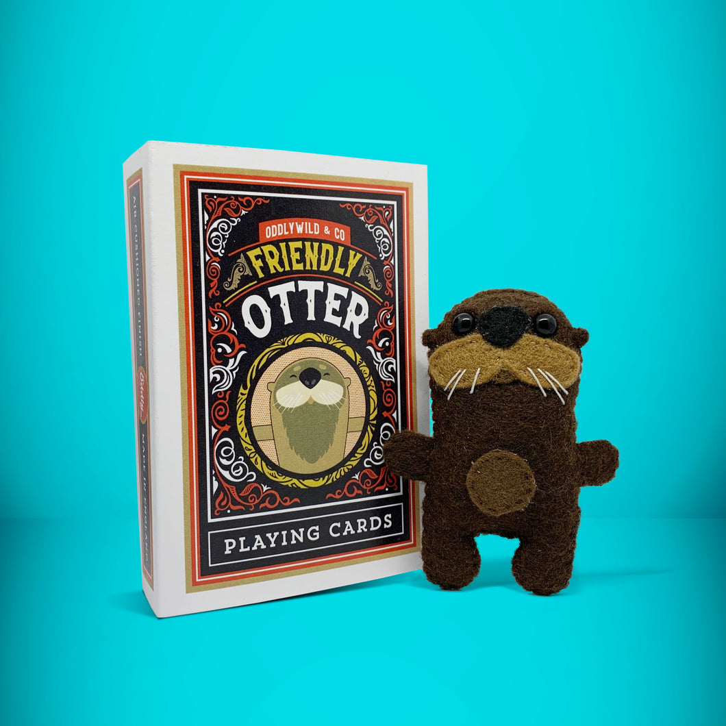 Mini brown otter felt toy that comes in its own bespoke matchbox. Complete with pillow and bedding - perfect for tucking in at night time. Your little friend also comes with an adoption certificate, collectible playing card, and thank you card.