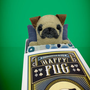 Handmade from felt this mini pug dog toy stands 110mm high and is perfect for your kids to that with them on their travels and adventures. Your little friend is small enough to fit in a pocket and comes with its own matchbox and bedding. 