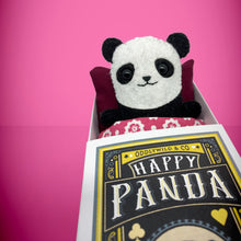 Load image into Gallery viewer, Handmade from felt this mini black and white panda toy stands 110mm high and is perfect for your kids to that with them on their travels and adventures. Your little friend is small enough to fit in a pocket and comes with its own matchbox and bedding. 