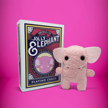 Load image into Gallery viewer, Mini pink elephant felt toy that comes in its own bespoke matchbox. Complete with pillow and bedding - perfect for tucking in at night time. Your little friend also comes with an adoption certificate, collectible playing card, and thank you card.