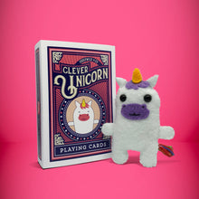 Load image into Gallery viewer, Mini white unicorn felt toy that comes in its own bespoke matchbox. Complete with pillow and bedding - perfect for tucking in at night time. Your little friend also comes with an adoption certificate, collectible playing card, and thank you card.