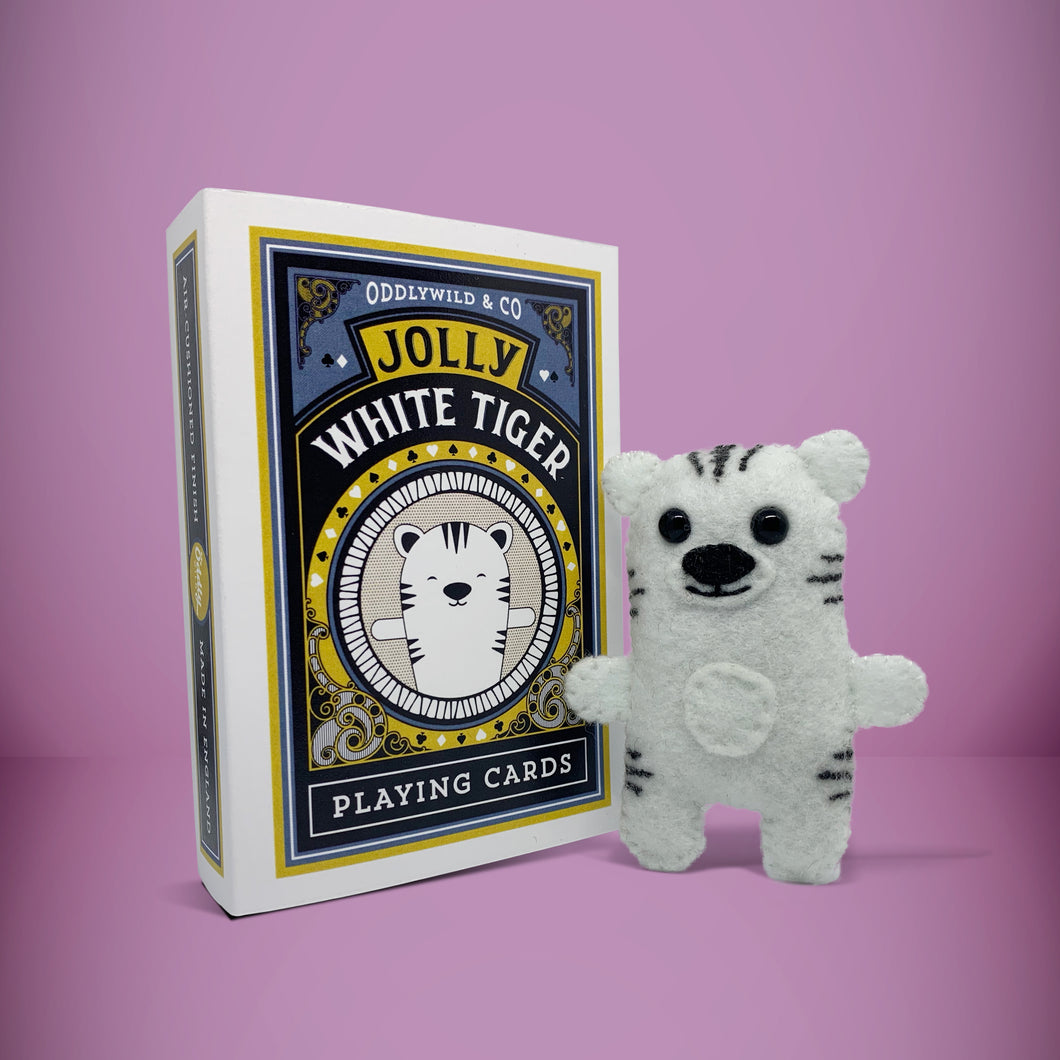 Mini white tiger felt toy that comes in its own bespoke matchbox. Complete with pillow and bedding - perfect for tucking in at night time. Your little friend also comes with an adoption certificate, collectible playing card, and thank you card.