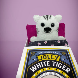 Handmade from felt this mini white tiger toy stands 110mm high and is perfect for your kids to that with them on their travels and adventures. Your little friend is small enough to fit in a pocket and comes with its own matchbox and bedding. 